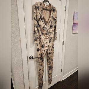 Nude Jumpsuit.  Faux tattoo. Sweetheart neckline